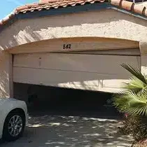 Image of Broken Garage Door in need of Repair