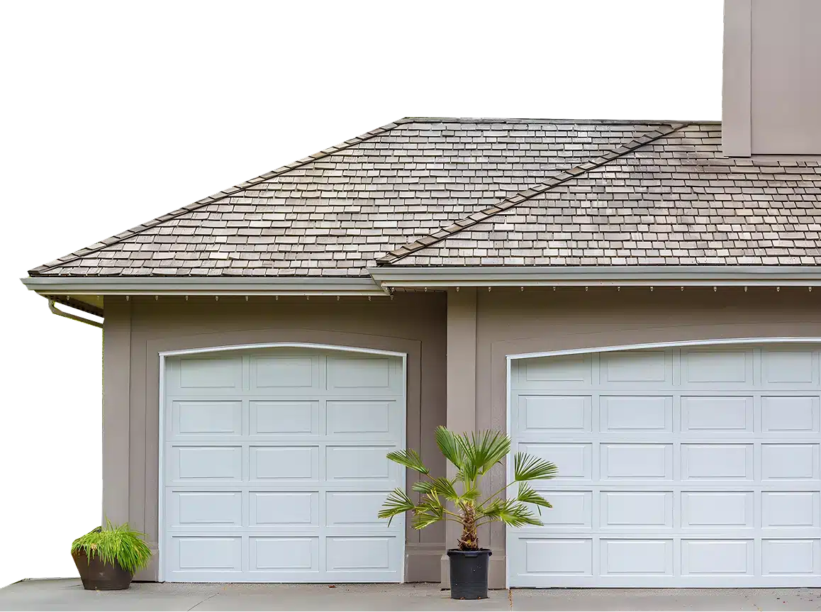 garage door closed on three-car driveway